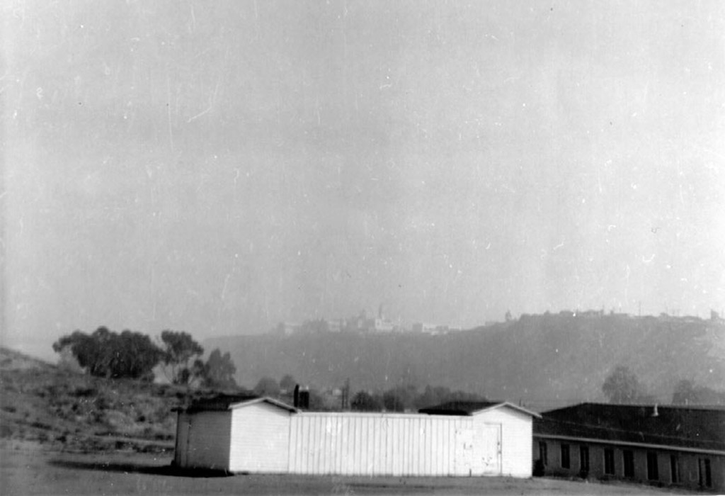 1957 Galveston Street looking towards USD with the Baptist Church and horse corral in the foreground.